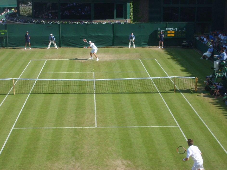 John Isner and Nicolas Mahut playing on Court 18 at Wimbledon in 2010
