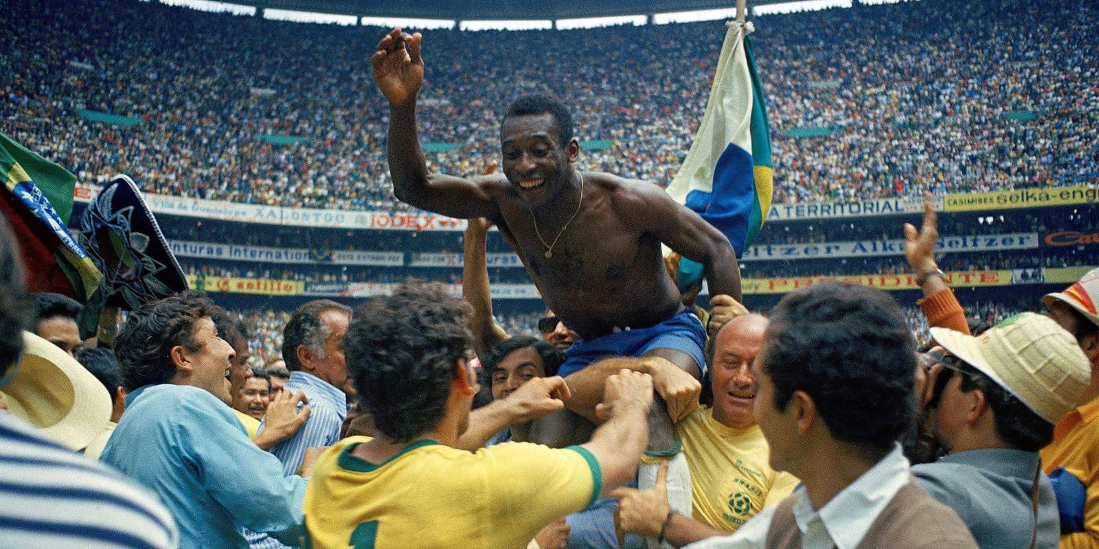 Pele celebrating in a Brazil shirt in 1970