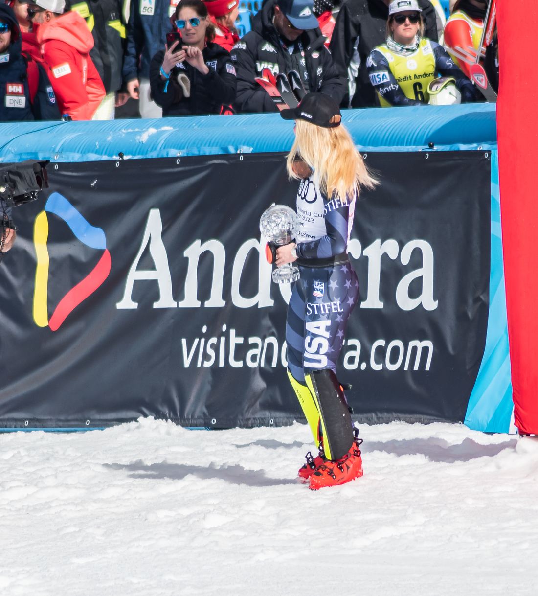 Mikaela Shiffrin holding the slalom crystal globe in 2023