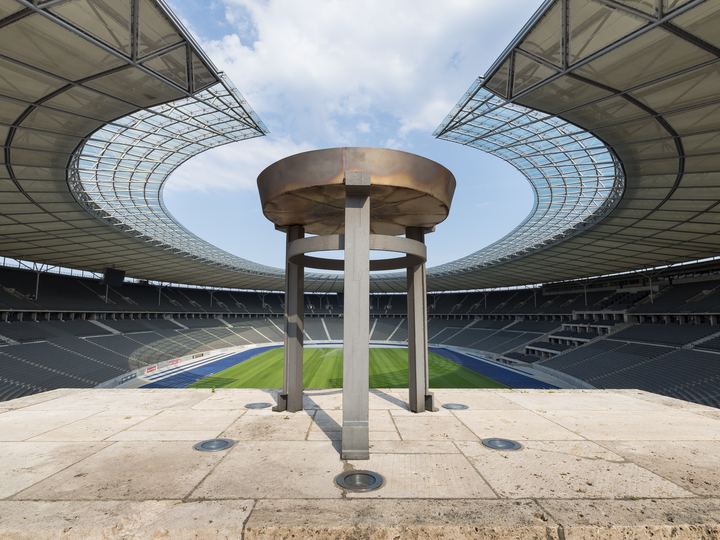 Inside the Olympic Stadium in Berlin with its blue running track